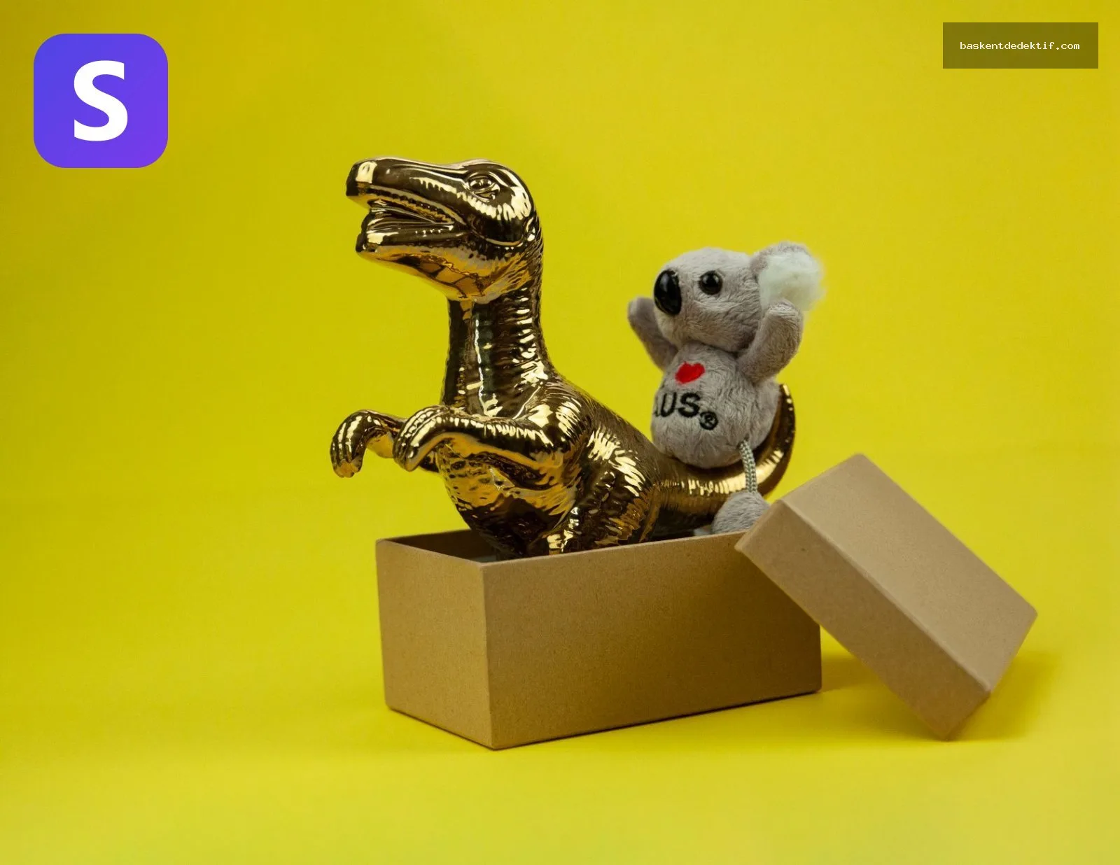 Dedektif Kapaklı ile altın renkli dinozor ve koala oyuncakları